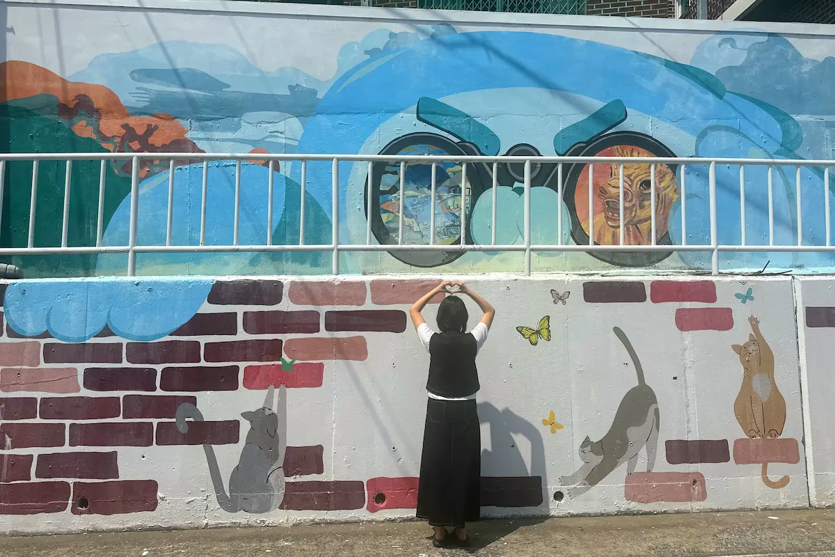 A cat mural on a hillside wall in Dongpirang Village in Tongyeong, Korea.
