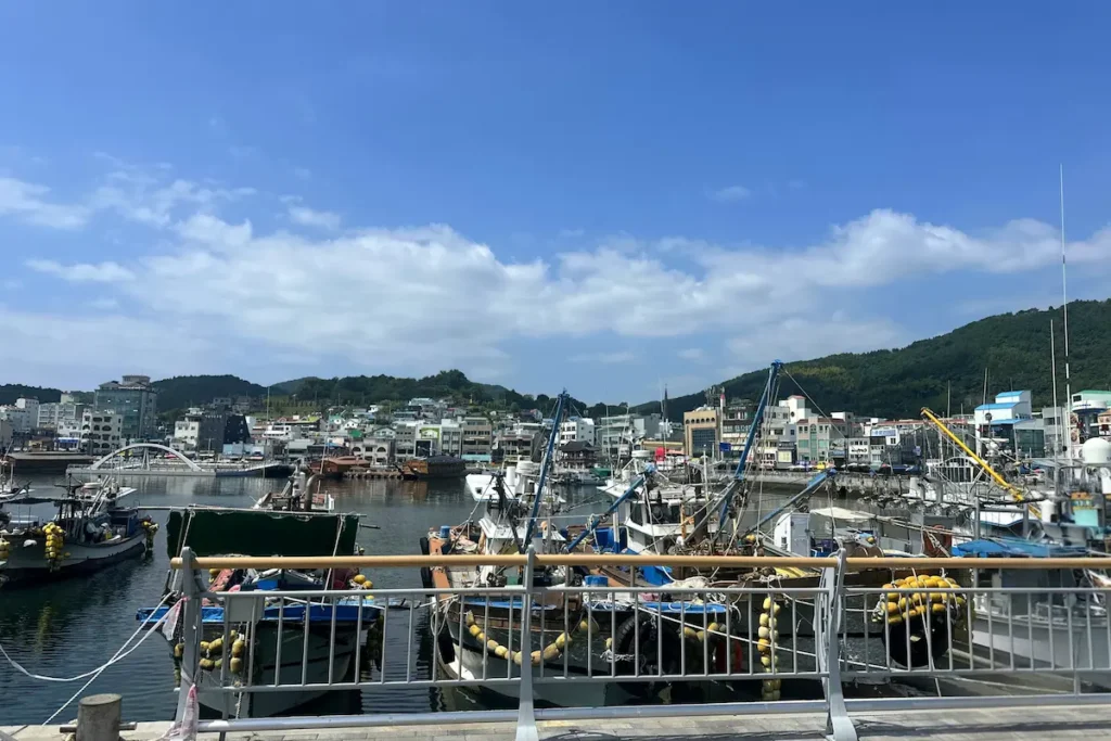 Fishing boats filling the harbor near Tongyeong Jungang Traditional Market in South Korea.