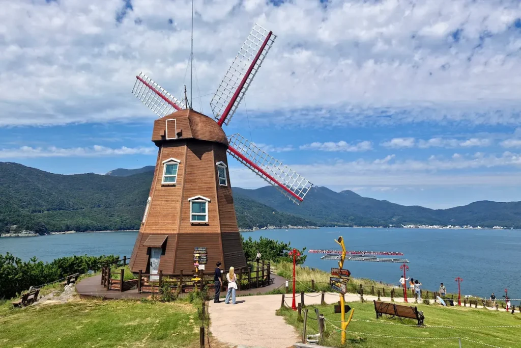 Wooden windmill overlooking the sea at Windy Hill in Geoje Island, South Korea.
